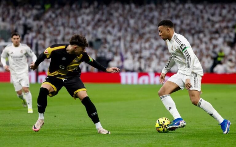 Vini deslumbra y Mbappé sentencia: el Real Madrid supera al Rayo en un final agónico